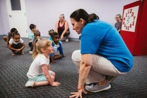 Teacher working with a child